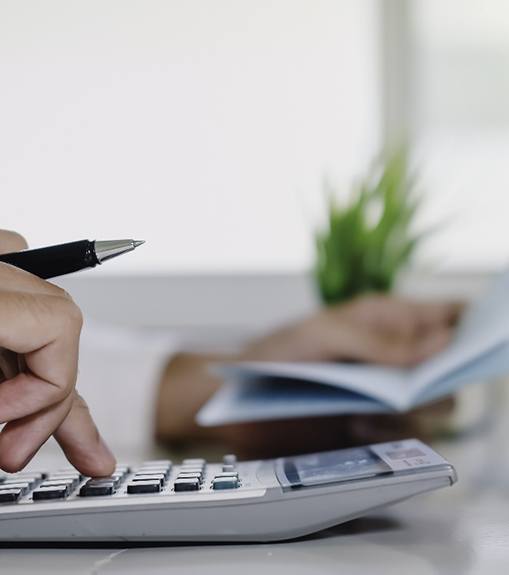 Man using a calculator