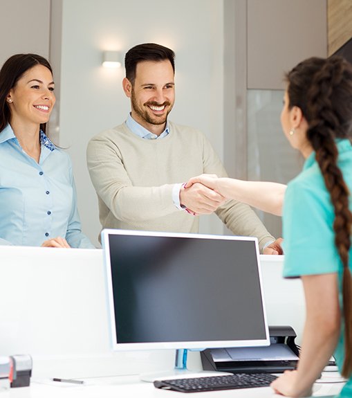 Couple meeting a receptionist