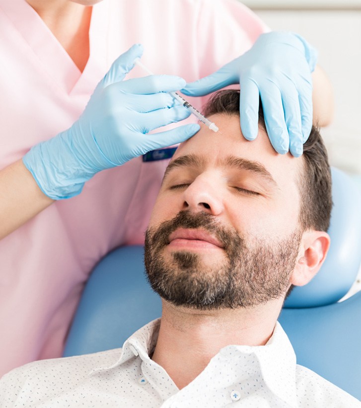 a man receiving BOTOX treatment