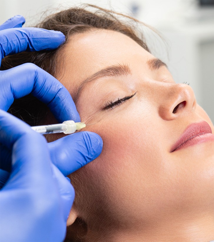 a person receiving BOTOX treatment