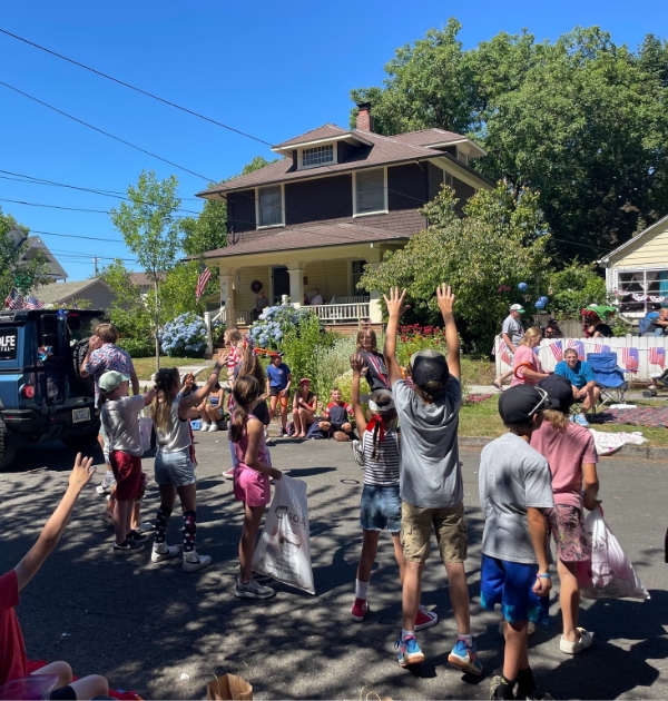 Two women volunteering at Beaverton community event