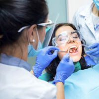 closeup of patient during dental cleaning